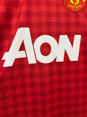 Red checkered football jersey front with large AON sponsor text