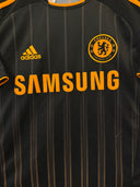 Black football jersey front with adidas logo, Chelsea crest, and SAMSUNG sponsor