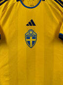 Yellow Sweden home shirt with blue collar, adidas logo and crest on chest