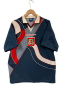 Navy Wales away football shirt front, Umbro logo and red Welsh crest