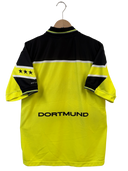 Back of yellow and black striped soccer shirt with DORTMUND name on hem