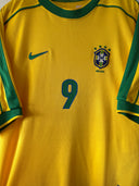 Brazil home soccer shirt with Nike swoosh, CBF badge, and number 9 front print