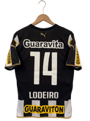 Black football jersey back with large 14, LODEIRO name, and yellow trim
