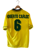 Yellow football shirt back with “ROBERTO CARLOS” name and green number 6