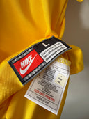 Brazil World Cup home shirt care label with Nike tag and size/keep away from fire note