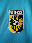 Sky blue football shirt with Vitesse crest patch on chest