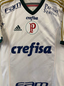 Palmeiras 2014 away shirt, white with green trim and sponsor logos on the front.