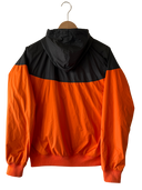 Hooded windbreaker jacket with black-and-orange panels and elastic cuffs