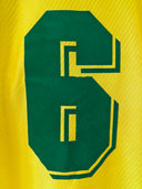 Yellow Brazil home football shirt back with green number 6 panel
