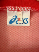 Red football jersey collar with white brand label and stitched trim
