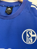 Blue Schalke home football shirt neckline with adidas logo and S04 crest