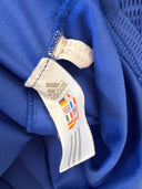 Schalke home football shirt with adidas size label and fabric tag detail