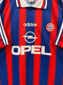 Blue and red striped football shirt with adidas logo, Opel sponsor, and Bayern crest