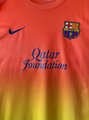 Nike swoosh and FC Barcelona crest with Qatar Foundation on chest