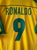 Brazil home soccer shirt back with RONALDO 9 and circular 9 emblem