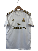 White football jersey on a hanger with Adidas logo, crest, and Fly Emirates text
