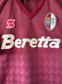 Maroon V-neck soccer jersey with ABM emblem and Beretta sponsor