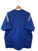 Blue Schalke home football shirt back view with shoulder stripes and hanging tag