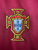 Maroon Portugal home shirt with embroidered crest badge on chest
