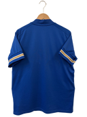 Blue football shirt back view with collar and gold-and-white sleeve stripes