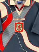 Navy Wales away football shirt with crest, Umbro logo, and red-and-white trim