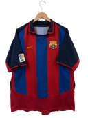 Red, blue, and navy striped football shirt front with Nike swoosh and club crest