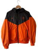 Zip-up hooded jacket with black-and-orange panels, crest logos, elastic cuffs