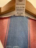 Blue and red striped football shirt with interior neck label and polyester tag