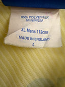 XL yellow football shirt size label reading 85% polyester, made in England, 4