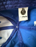 FC Porto blue cap close-up with stitched panels and FC Porto label tag